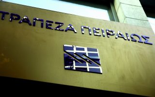 Healthy outlook for Piraeus Bank after slashing bad loans