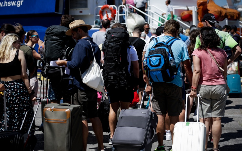 Greeks traveling more this summer, especially abroad