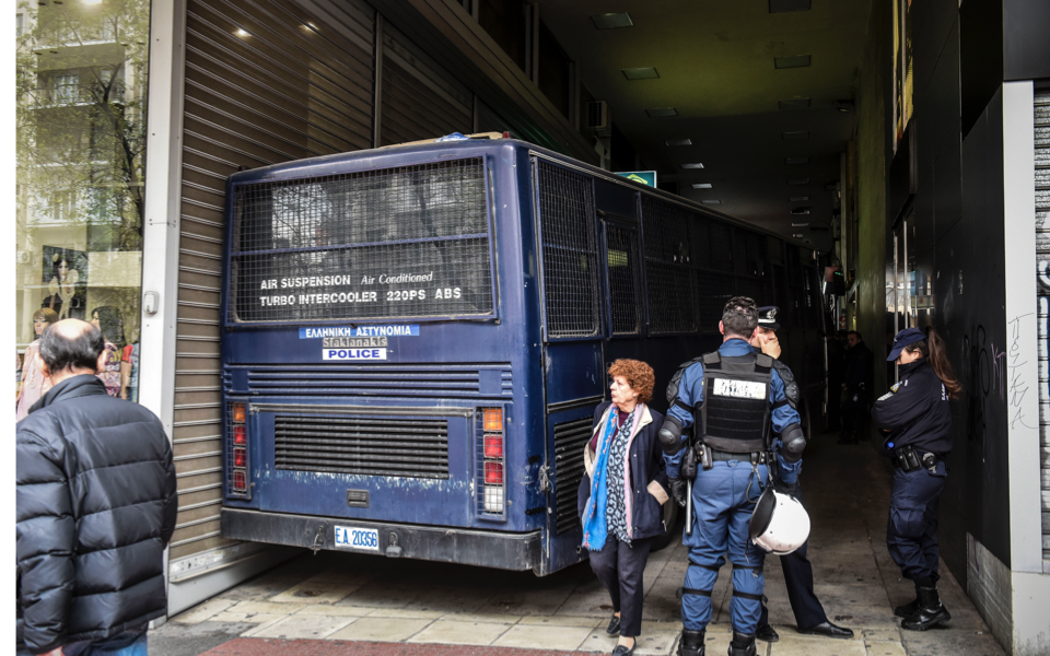 Police bus enlisted to protect notaries from protesters