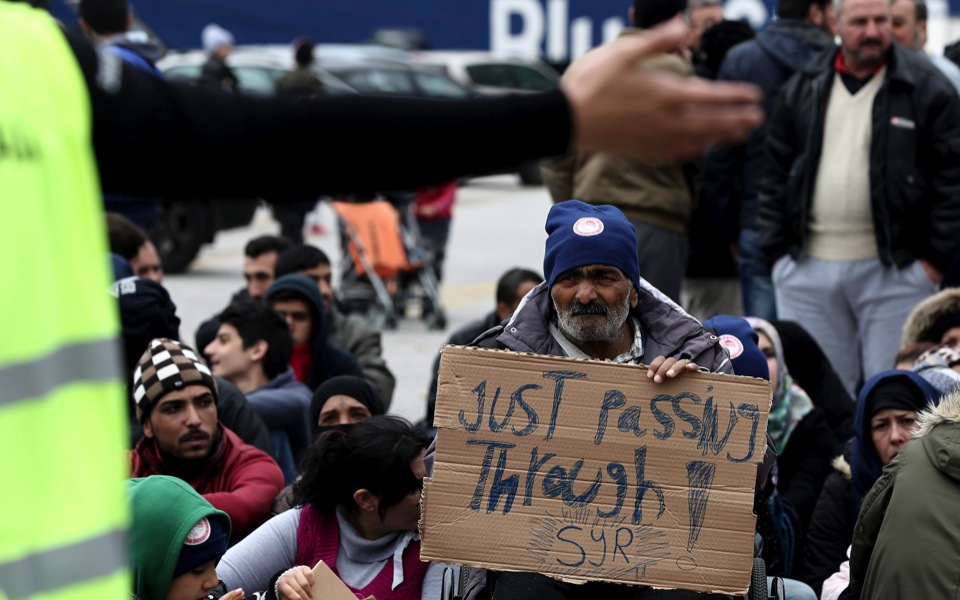 Refugees trapped in Greece protest at port