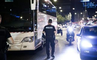 Man who opened fire on tourist coach turns himself in to police