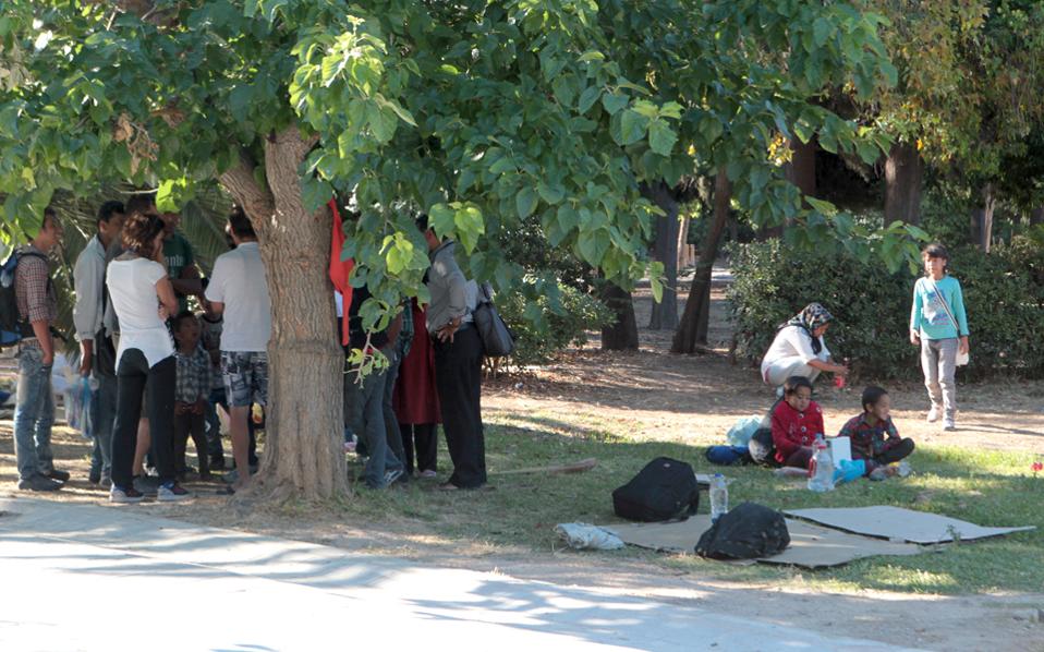 Half of some 200 refugees living in Athens park are children, says NGO