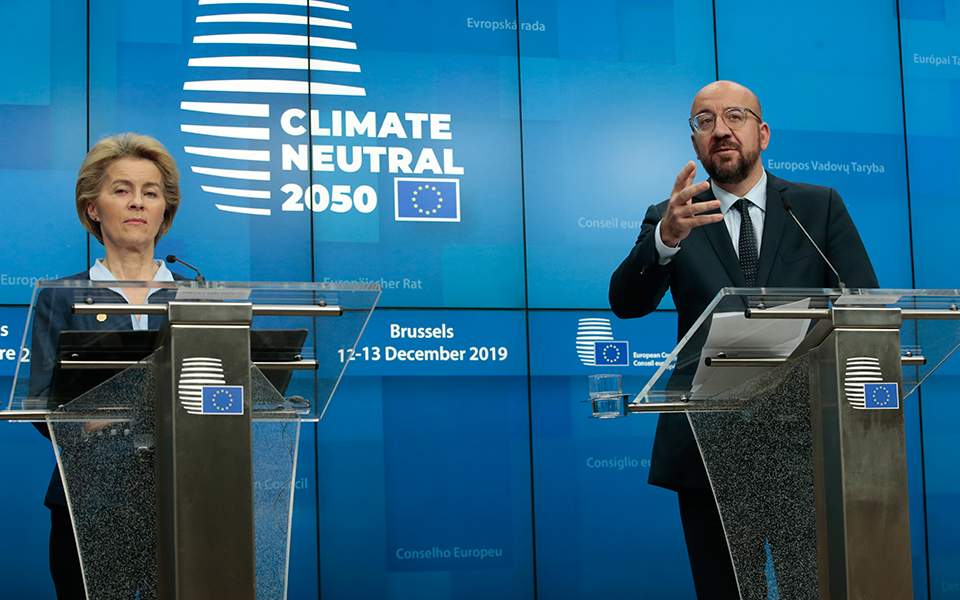 EU leaders break stalemate over climate target, claim deal