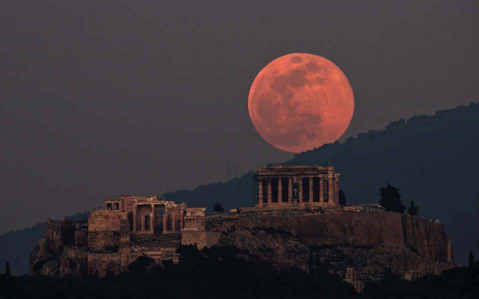 Supermoon rises over the Parthenon