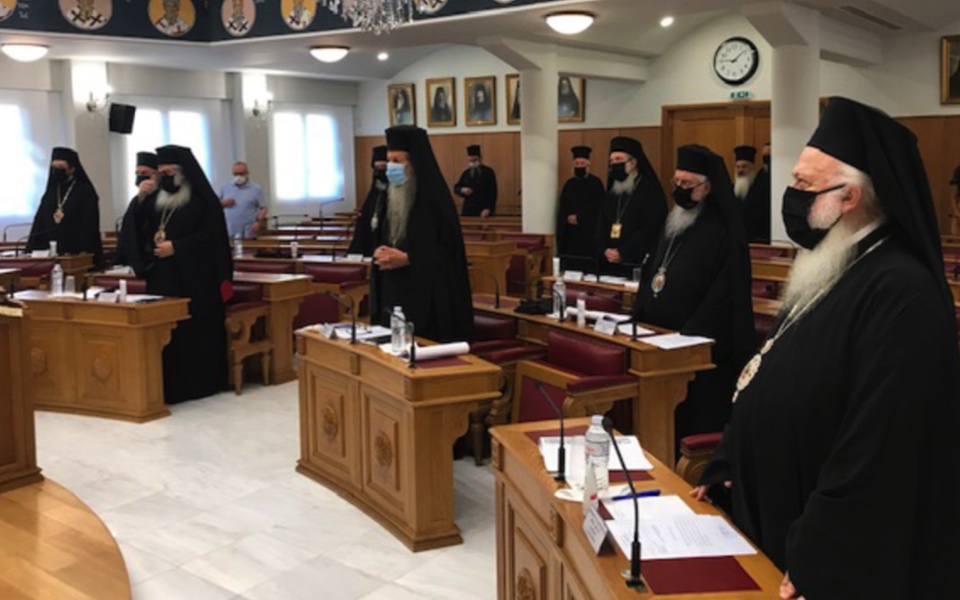 Holy Synod convenes with clerics wearing face masks