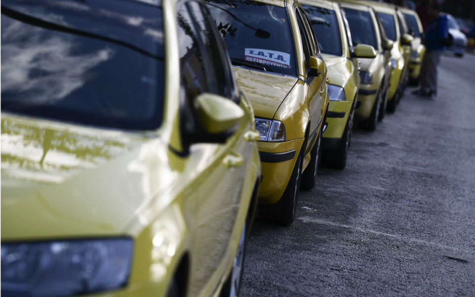 Greek taxi drivers strike in protest against ride-hailing firm