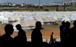 Tensions high at Greece’s migrant, refugee camps