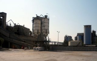 Greek cement maker Titan narrows losses helped by US