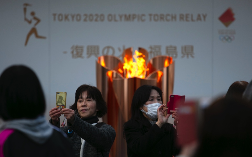 Tokyo Olympic flame taken off display; next stop unclear