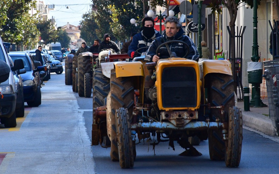Farmers drive tractors through Argos in austerity protest