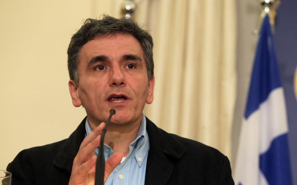 Tsakalotos faces MPs as new multi-bill of reforms goes to House amid debt debate
