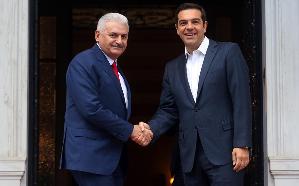 Greek, Turkish leaders meet amid tension over servicemen