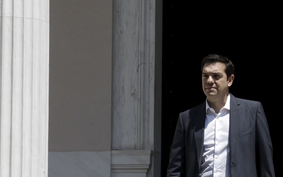 Tsipras takes time on reshuffle, as Eurogroup clears way for third bailout