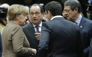 The odd couple: Merkel, Tsipras fate tied over EU refugees deal