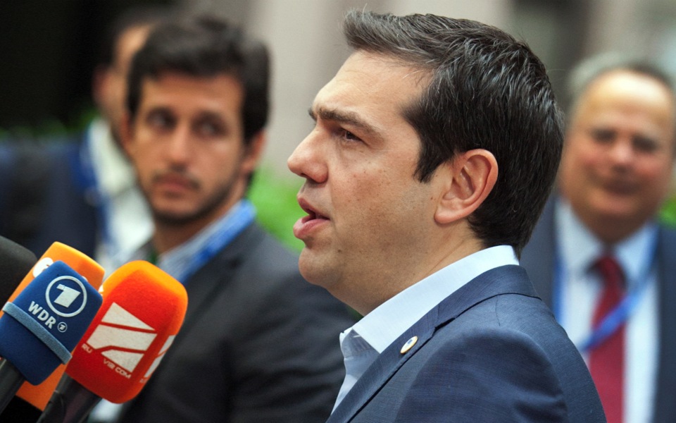 Greek PM tells Washington all sides must want deal
