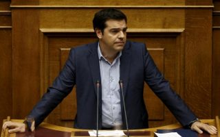 Tsipras says IMF behavior in Greek crisis not constructive
