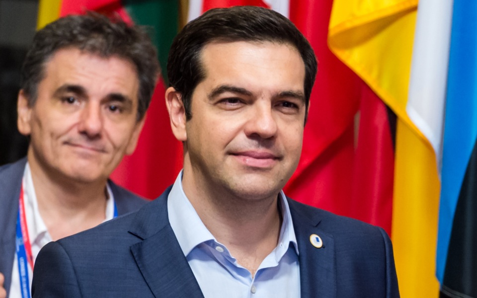 Tsipras defends financial rescue deal