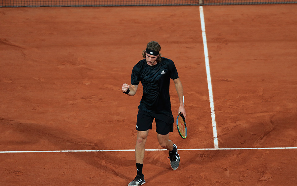 Tsitsipas waltzes into French Open quarter-finals