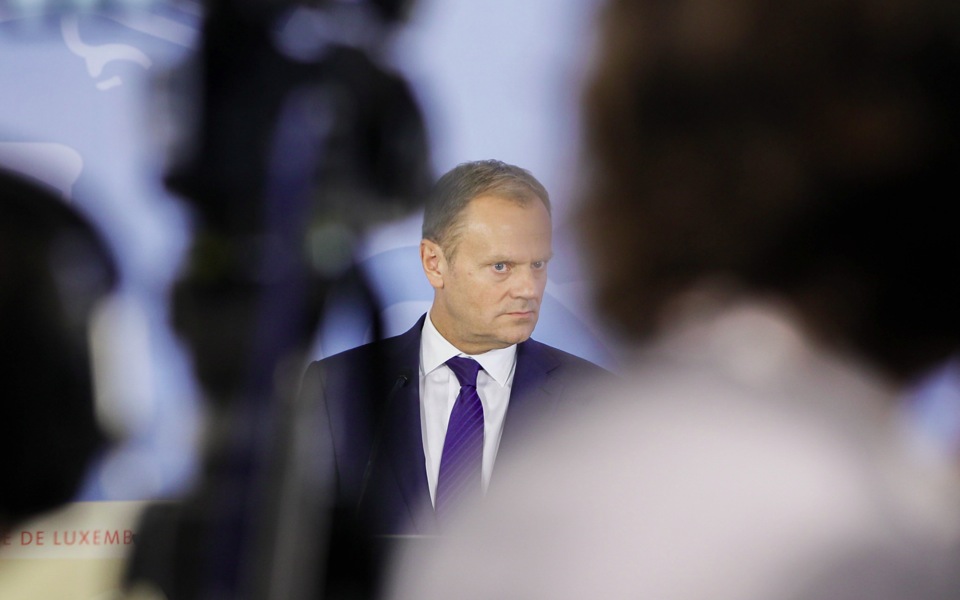 Tusk urges debt relief as part of Greek deal