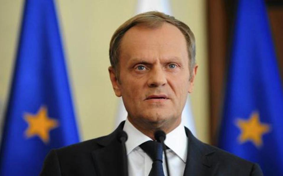 Tusk warns economic migrants, voices solidarity with Greece