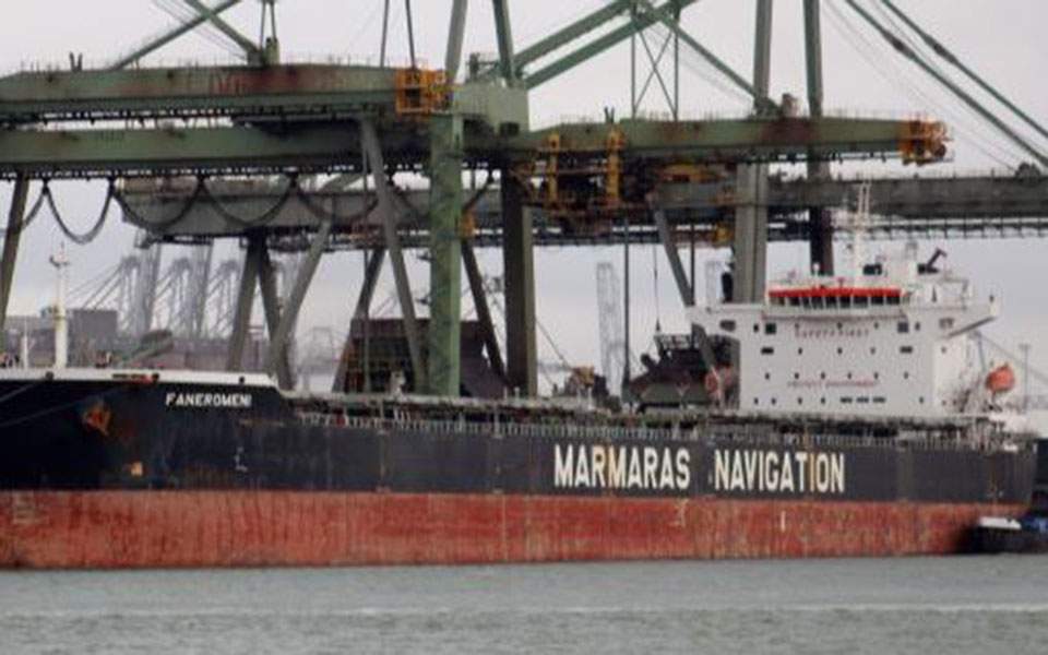 Greek-flagged cargo ship catches fire