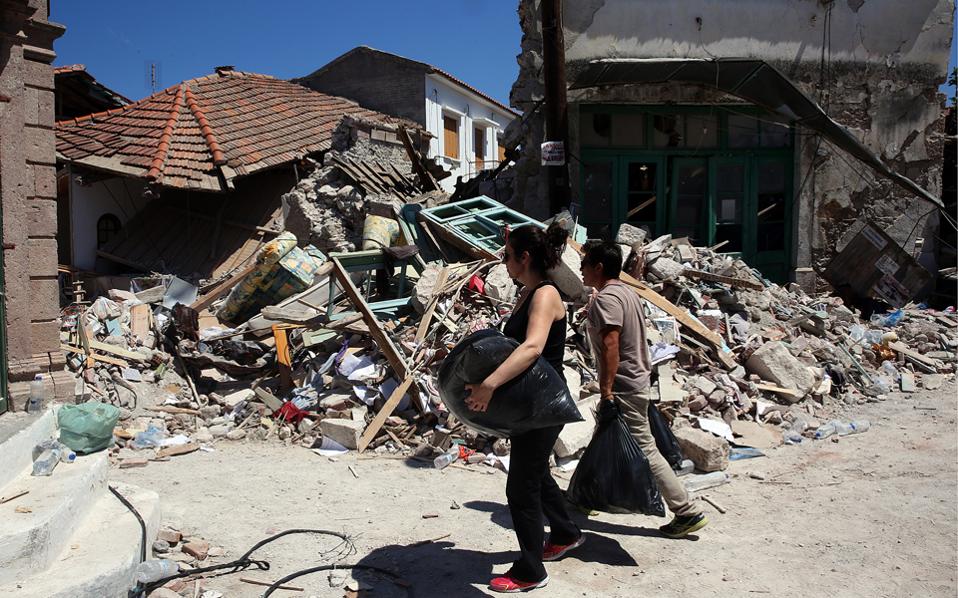‘He was on a mattress upstairs, then suddenly on the street’: Greeks count cost of island quake