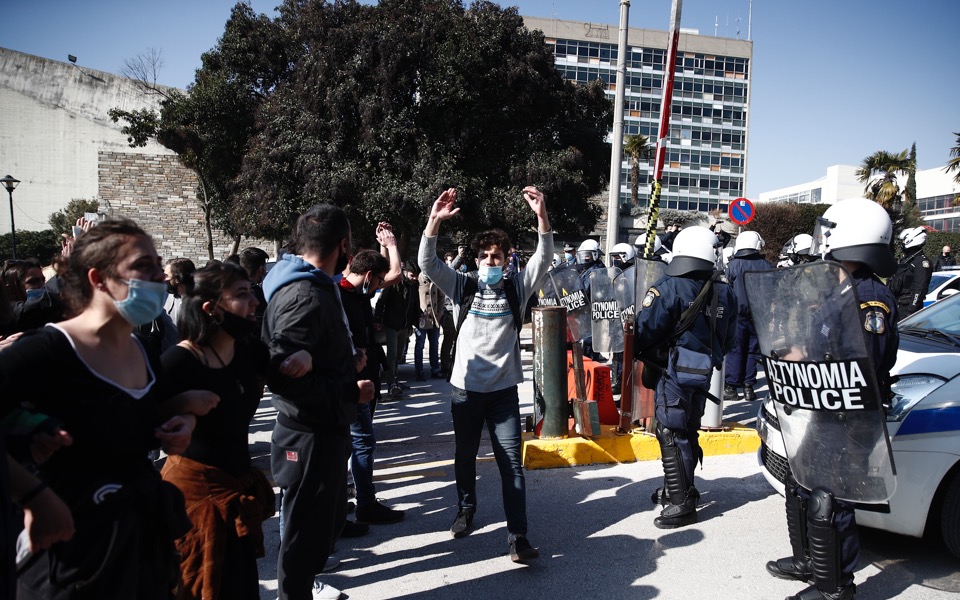 Dozens detained in clashes over campus security law