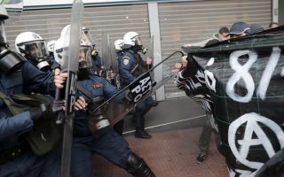 Protesters supporting jailed terrorist clash with police in central Athens