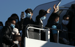 Over 100 refugees flown to Germany