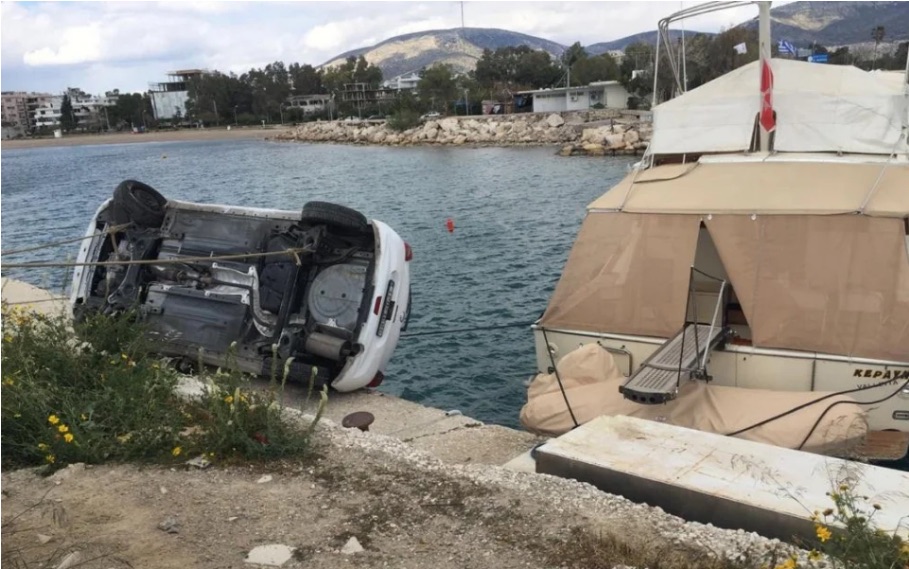 Overturned car lands half a meter from the sea