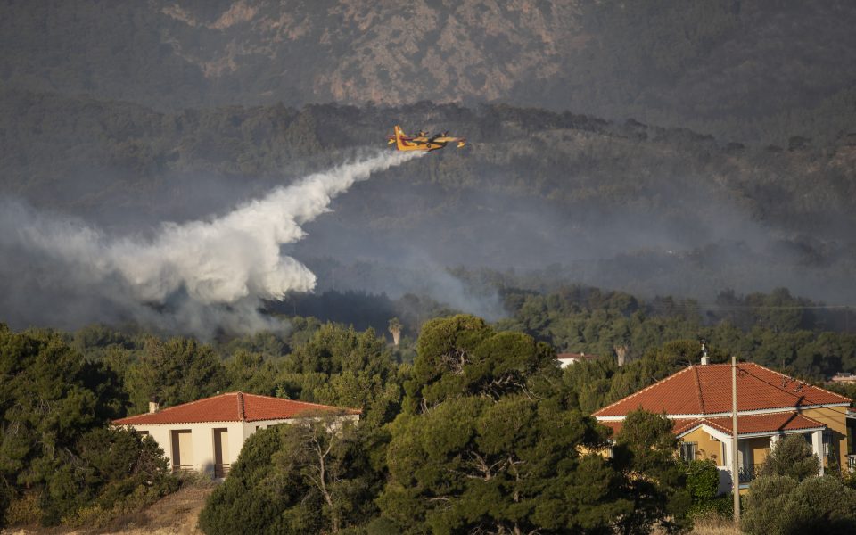 Two more communities evacuated near Megara as fire rages for second day