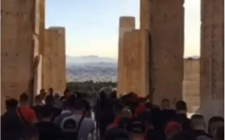 Olympiakos fans barge into the Acropolis to celebrate title