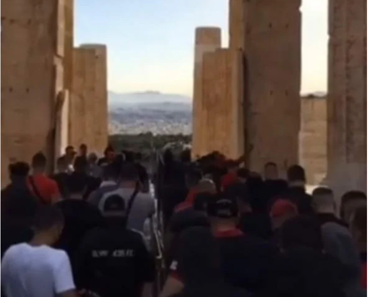 Olympiakos fans barge into the Acropolis to celebrate title