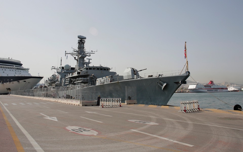 British Navy frigate docks at Piraeus