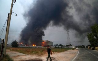 Over 1,000 electricity poles burnt in Attica