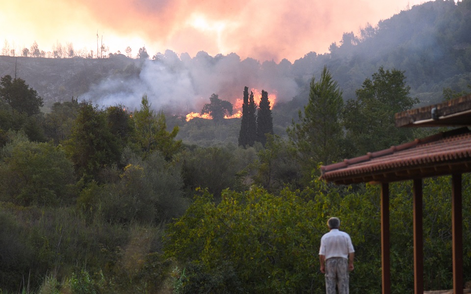 Peloponnese, Evia fires stoked by fresh conflagrations