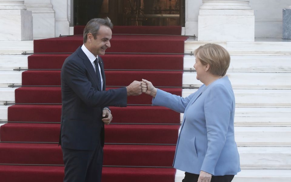 Mitsotakis tells Merkel that Greece is now very different