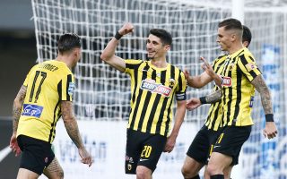 AEK beats Aris to stay one point behind Olympiakos