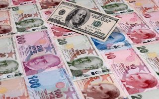 Turkish lira in free fall after latest rate cut urged by Erdogan