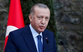 Erdogan says Turkey will respond to Greek buildup