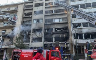 Explosion damages offices, stores in Athens; 3 hurt