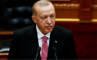 Erdogan calls on citizens, firms to convert foreign currency savings into liras