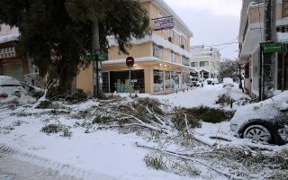 Dozens of Athens suburbs still without power