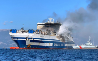 Search for missing in ferry blaze hampered by extreme temperatures