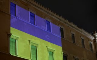 Ukrainian flag adorns Parliament facade