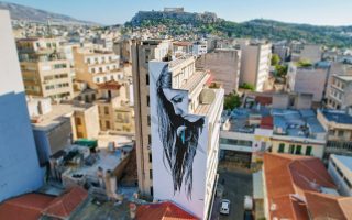 Climate murals painted across Greek capital
