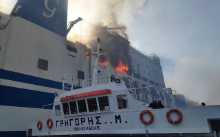 Man rescued from burning ferry