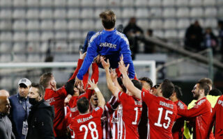 Olympiakos clinches Super League title in style