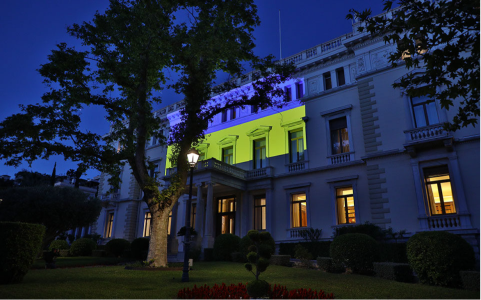 Presidential Mansion lit up in Ukraine flag colors on Europe Day
