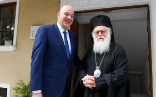 Greek FM meets Archbishop Anastasios of Albania, members of ethnic Greek minority